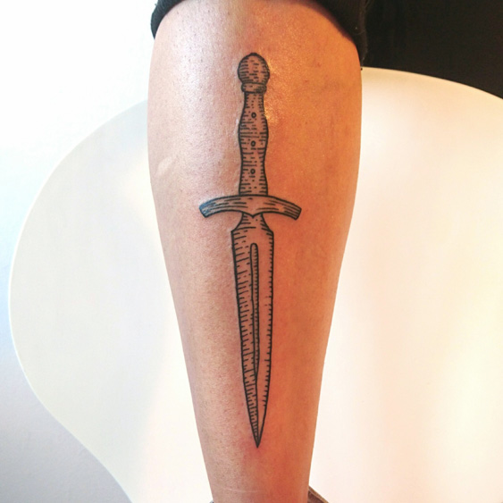 Black dagger tattoo. lineworktattoo woodcuttattoo