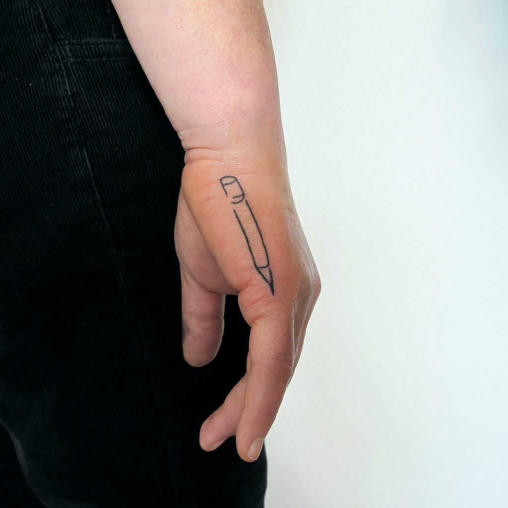 small pencil tattoo on finger, ignorant style